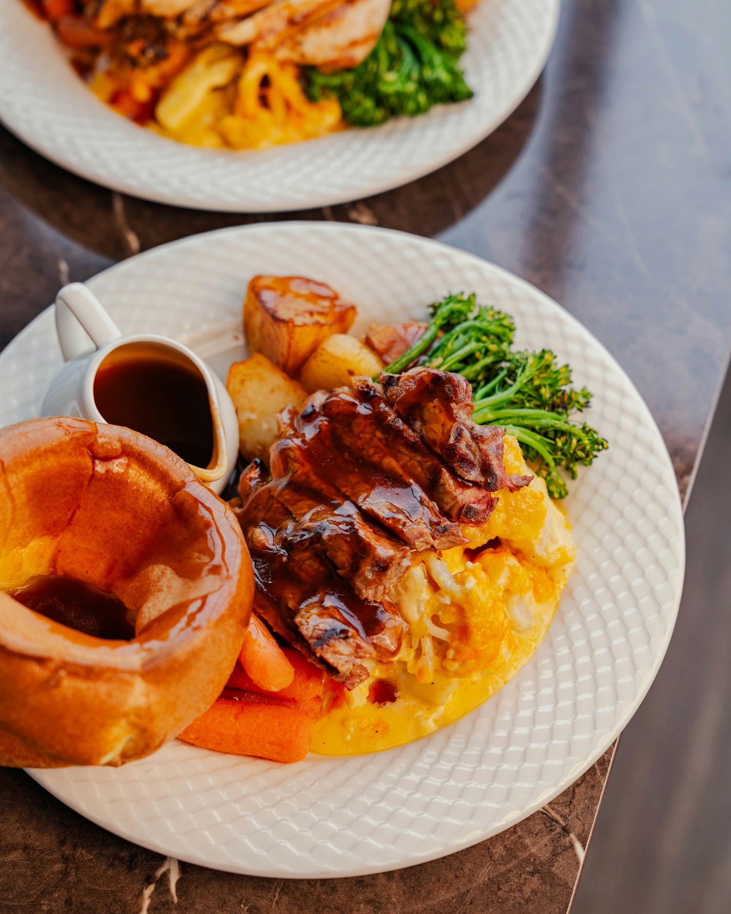 Sunday roast with beef, Yorkshire pudding and gravy