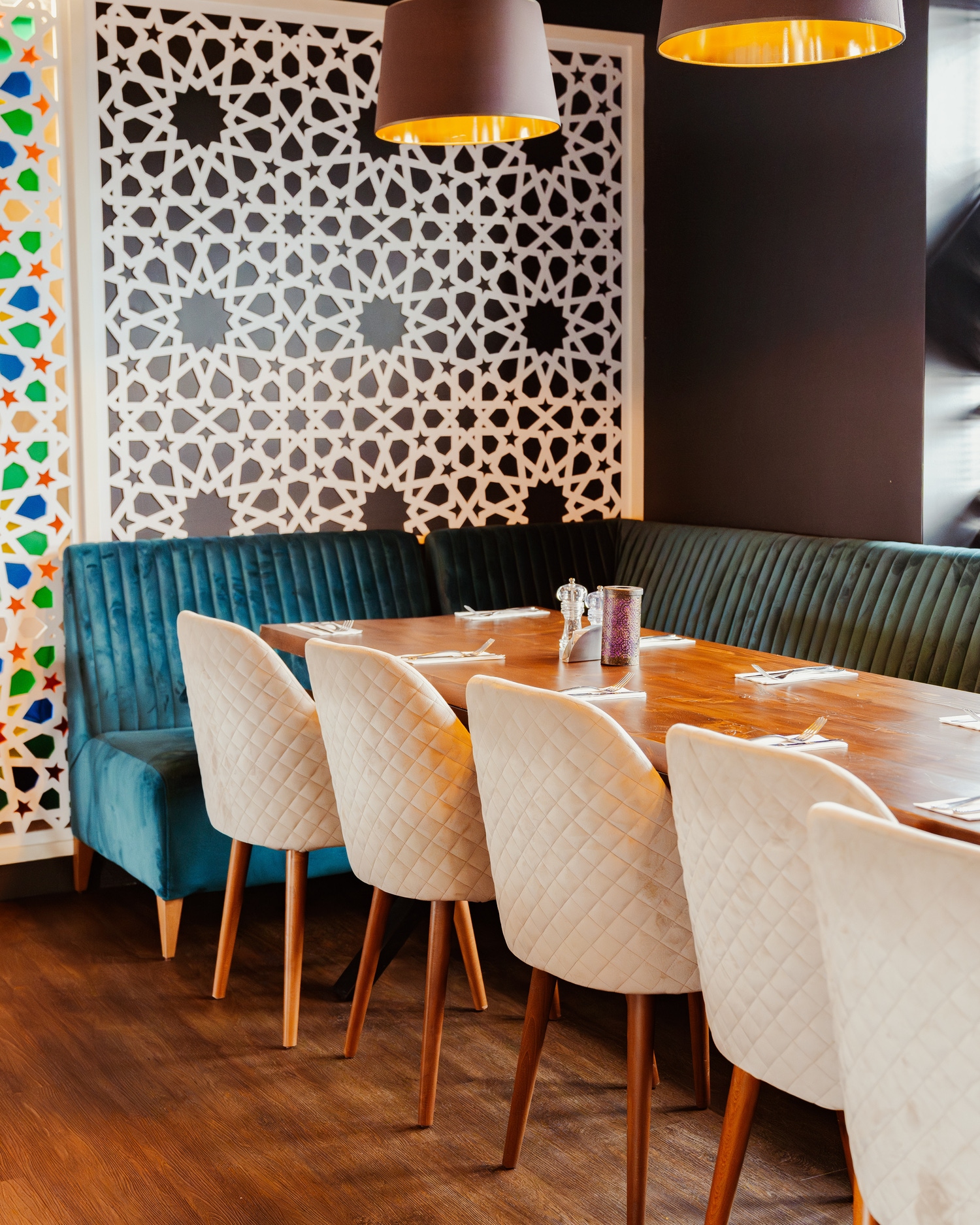 Booth seating and decorative screen in the restaurant