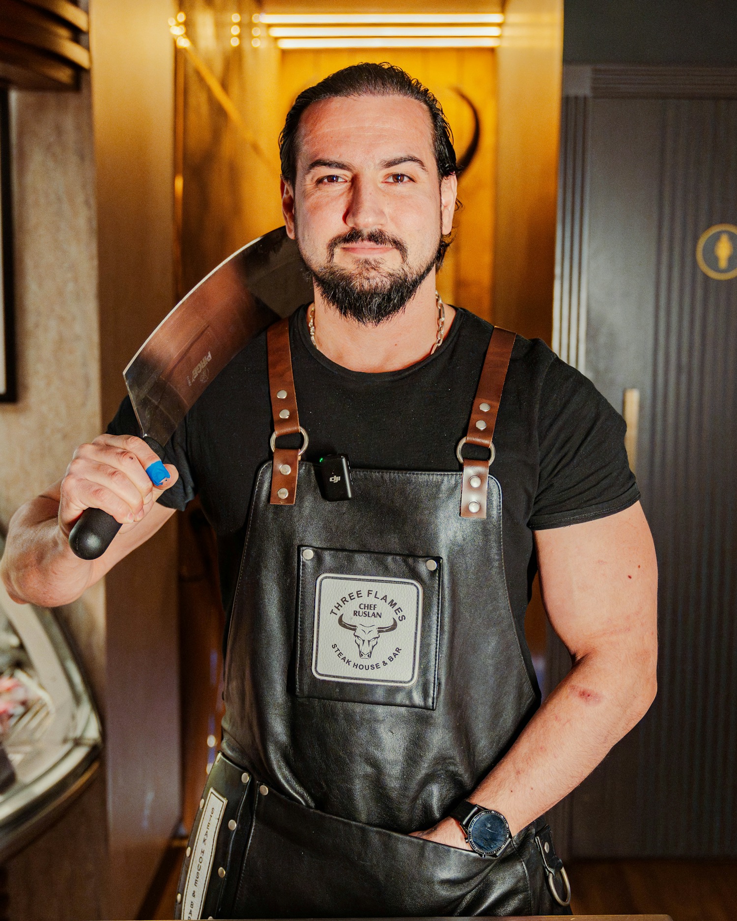 Chef Ruslan with a cleaver at Three Flames